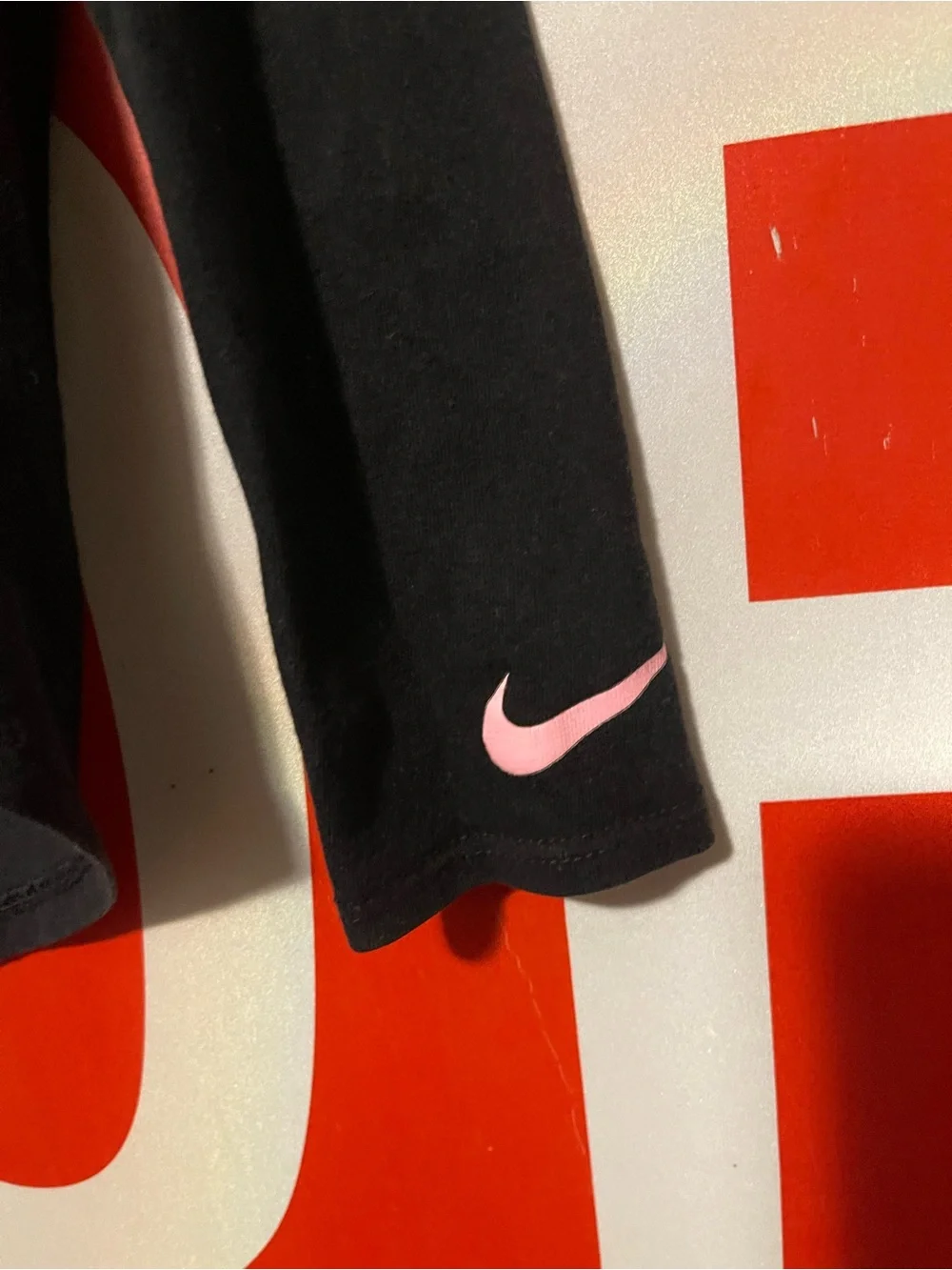 Nike Black Long-Sleeve Tee with Pink Heart and Silver Swoosh
